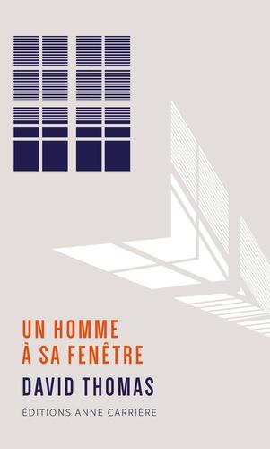 UN HOMME A SA FENETRE