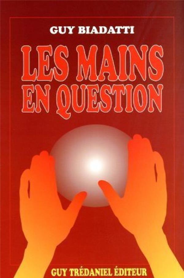 LES MAINS EN QUESTION