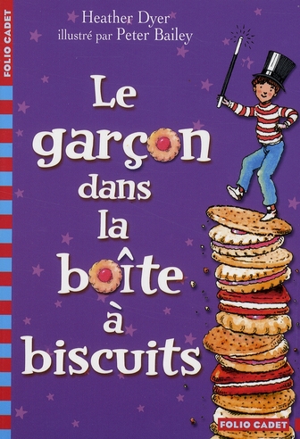LE GARCON DANS LA BOITE A BISCUITS