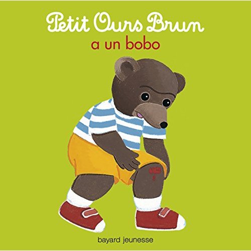 PETIT OURS BRUN A UN BOBO