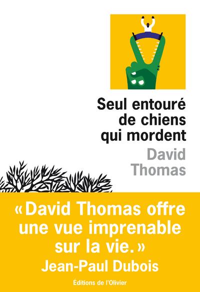 Seul entoure de chiens qui mordent